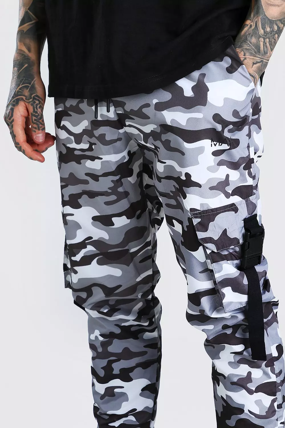 Boohooman shell outlet buckle joggers